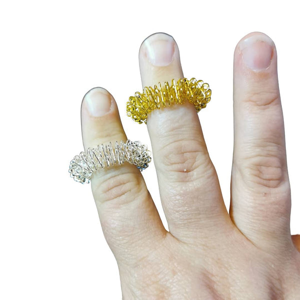 acupressure rings in gold and silver